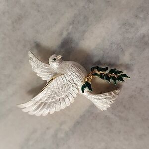 Dove holding green olive branch brooch